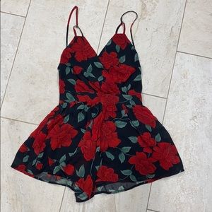 Adorable open back romper